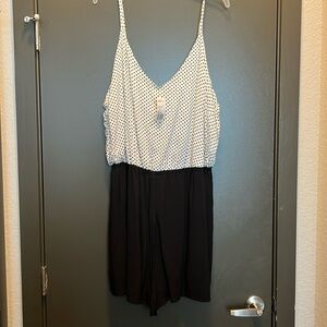 Black-and-cream.  forever 21 romper never worn and new with tag size 3X .
